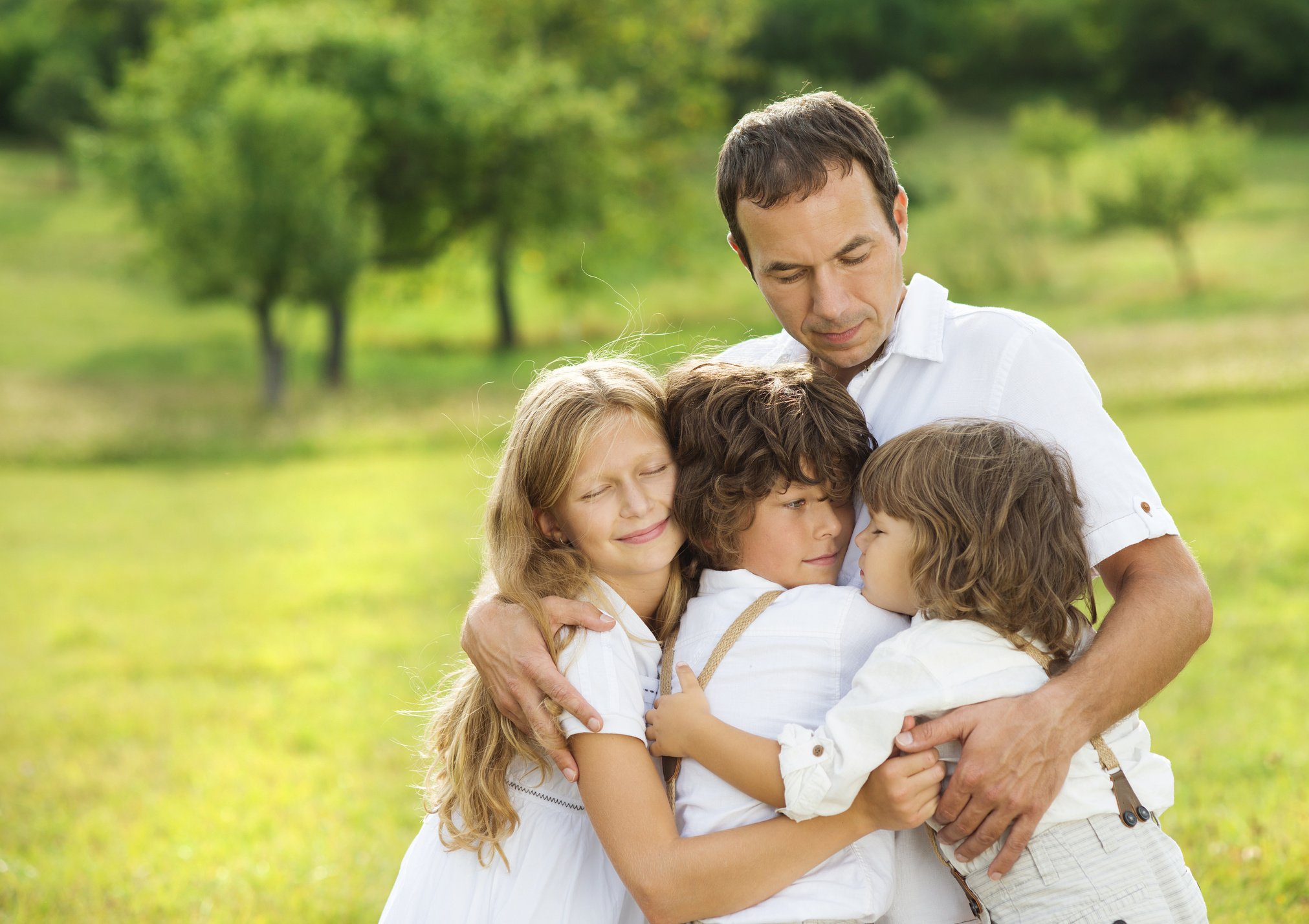 Children and Dad Hugging