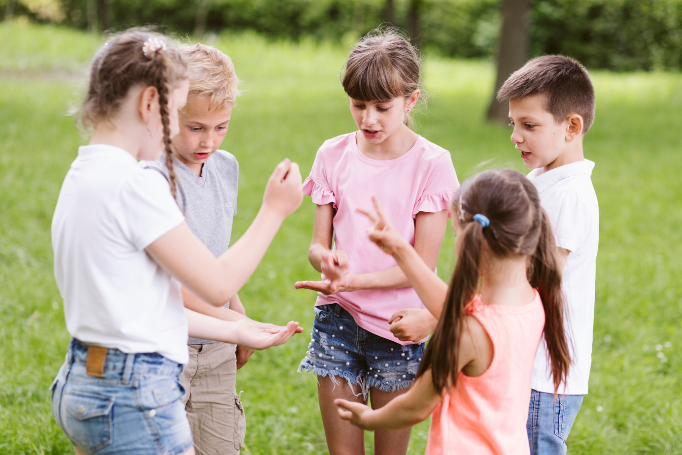 children playing rock scissors paper